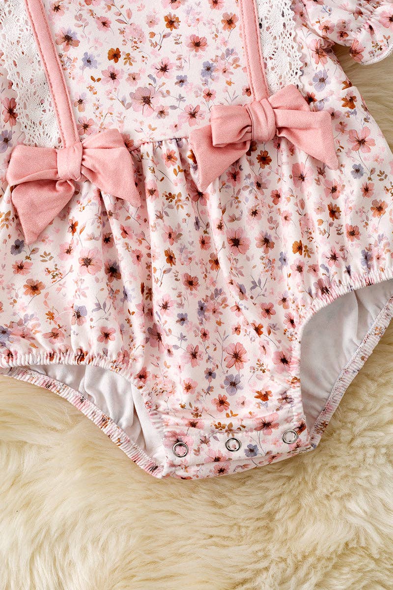 Ditsy floral baby romper with front bows